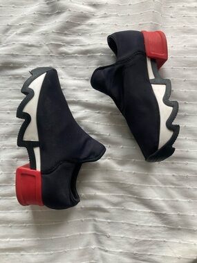 Women's Black Athletic Slip-On Sneakers with Red Heel Accent